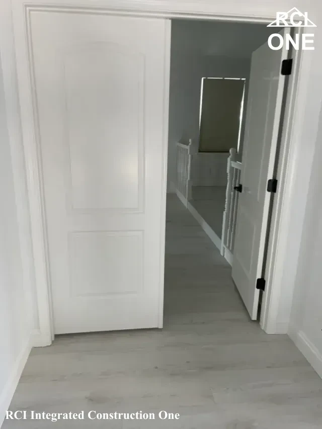 Clean Hallway with White Doors