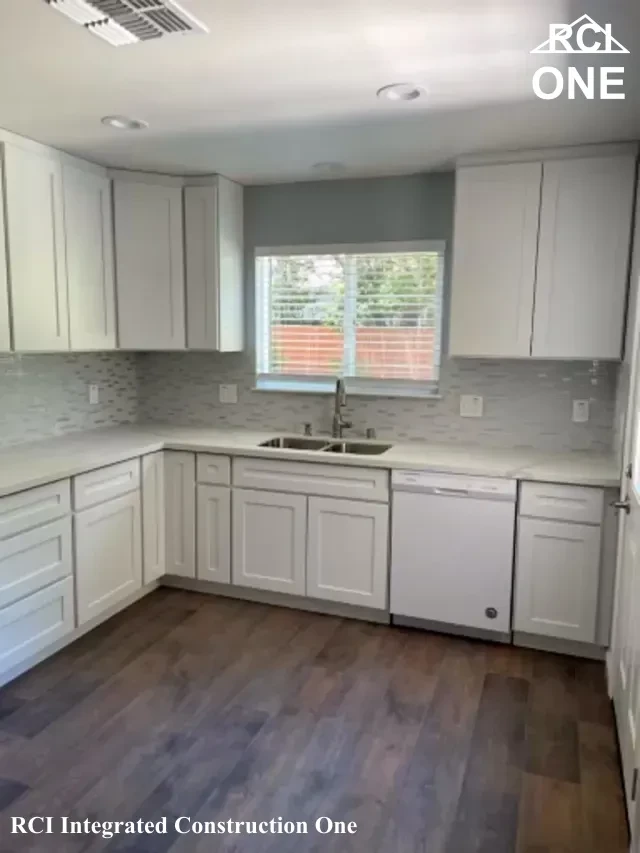 Modern White Kitchen with Hardwood Floors