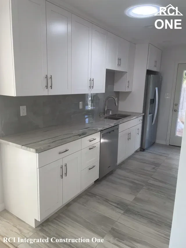 Modern White Kitchen with Marble Counters